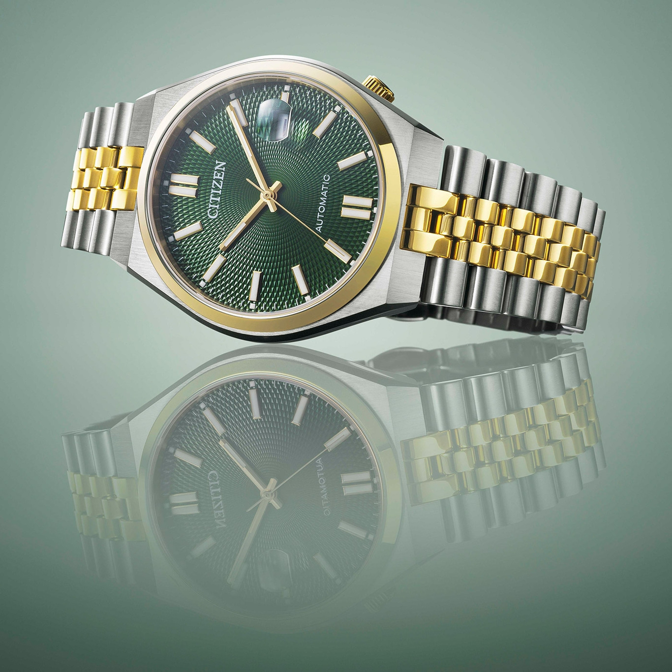 Citizen-Uhr mit grünem Zifferblatt und gold-silbernem Armband