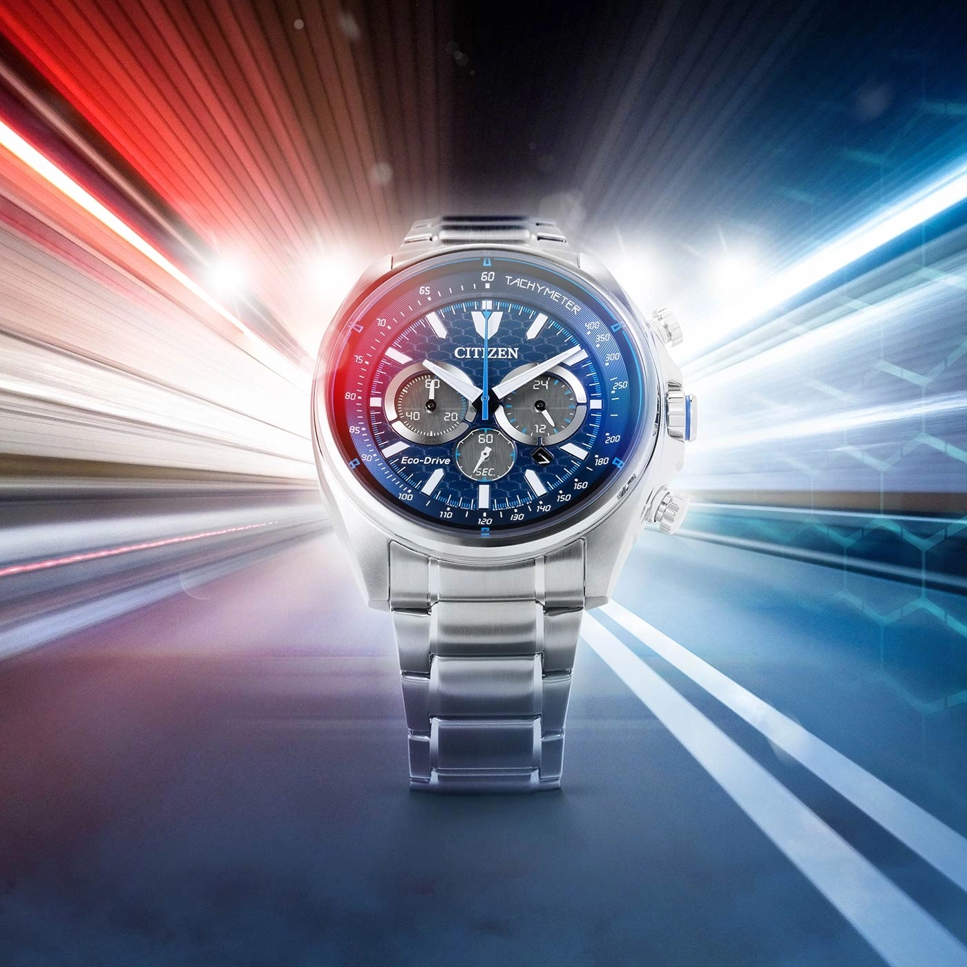 Citizen-Uhr mit blauem Zifferblatt und silbernem Armband, Tachymeter, Eco-Drive, Geschwindigkeitslinien.