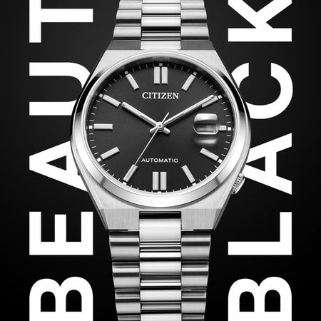 Citizen-Uhr mit schwarzem Zifferblatt, silbernem Armband und den Worten BEAUTY BLACK.
