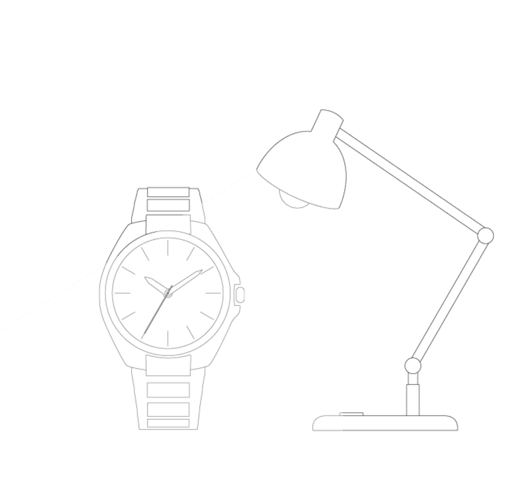 Uhr, die von einer Schreibtischlampe beleuchtet wird, die die Zeit anzeigt.