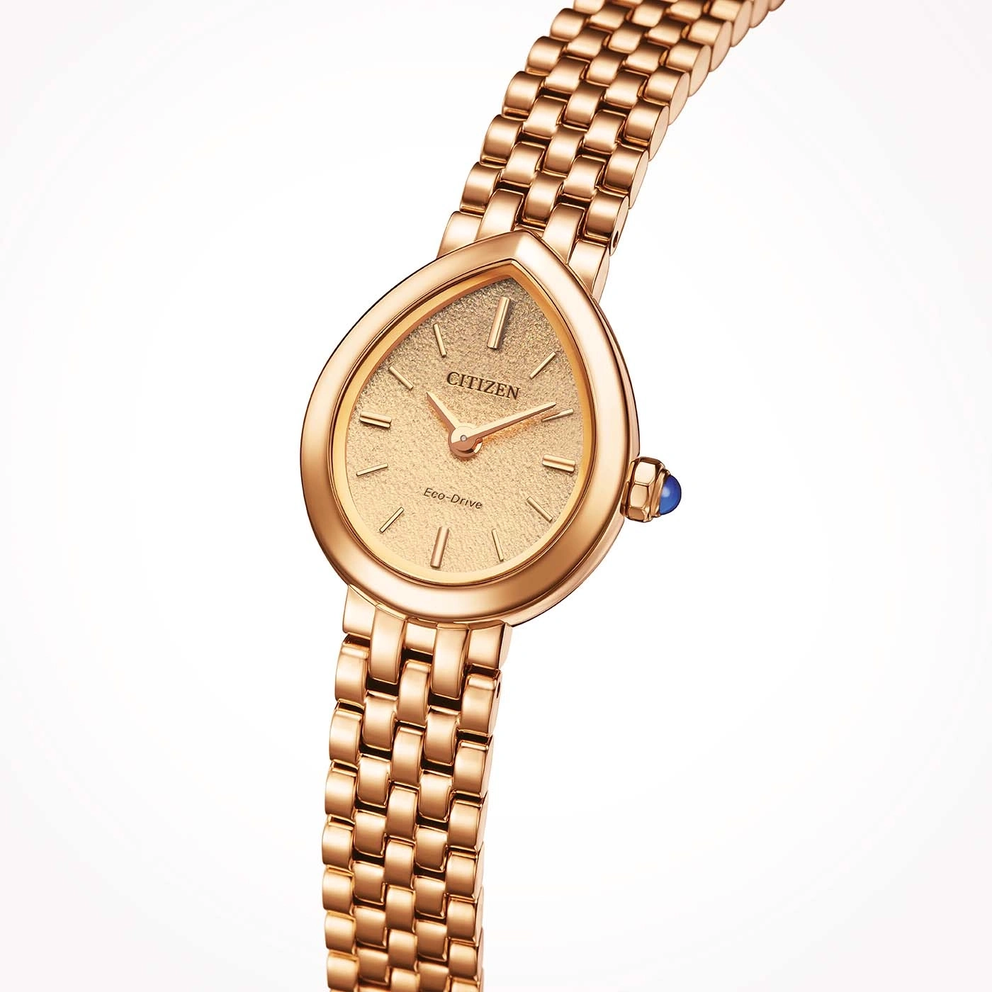 Eine roségoldene Citizen-Uhr mit tropfenförmigem Zifferblatt und blauer Akzentuierung.