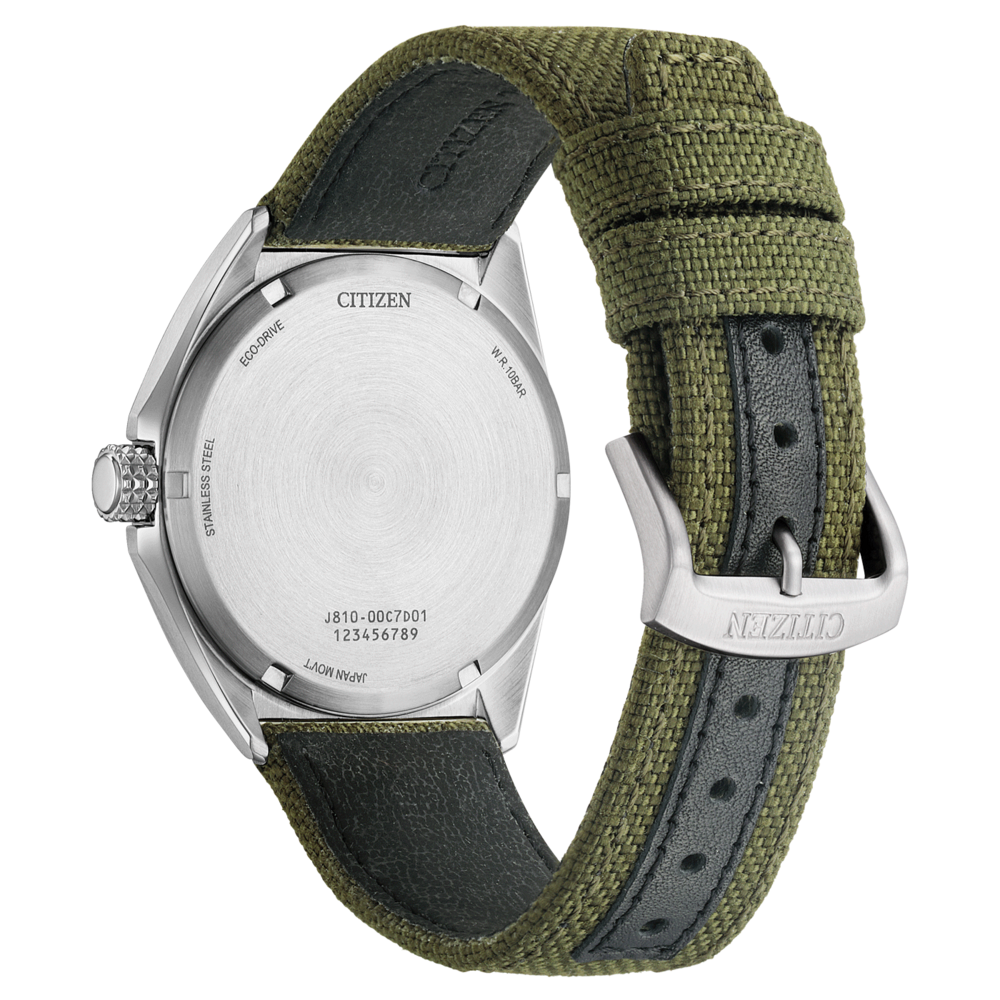 Citizen-Uhr, Rückseite mit Text, grünes Armband, Edelstahl, Nahaufnahme.