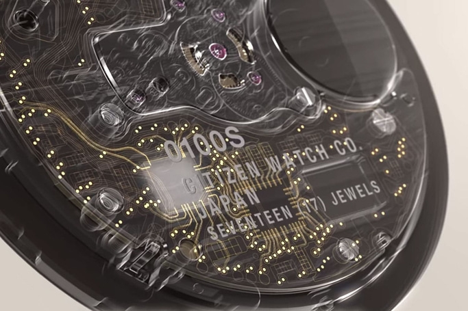 This image features a detailed, futuristic x-ray or transparent view of a watch movement, labeled '0100S CITIZEN WATCH CO. JAPAN'. Intricate circuits and glowing components highlight its high-precision internal mechanics.