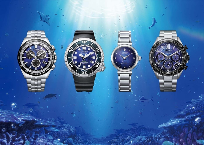 Citizen-Uhren unter Wasser mit blauen Zifferblättern und Edelstahlarmbändern.