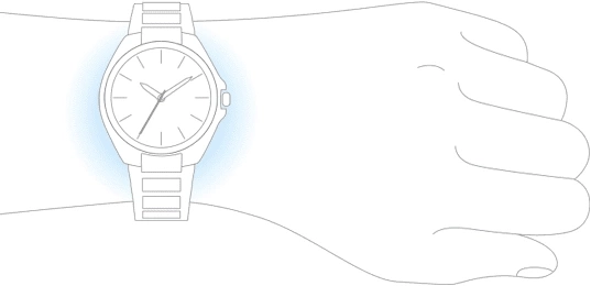 Ein Handgelenk mit einer Uhr, die Hand ist zu einer Faust geballt.