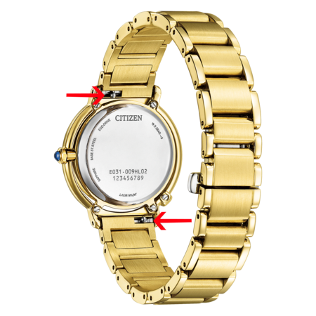 A gold Citizen watch with a visible watch band attachment mechanism on the back, indicated by red arrows.
