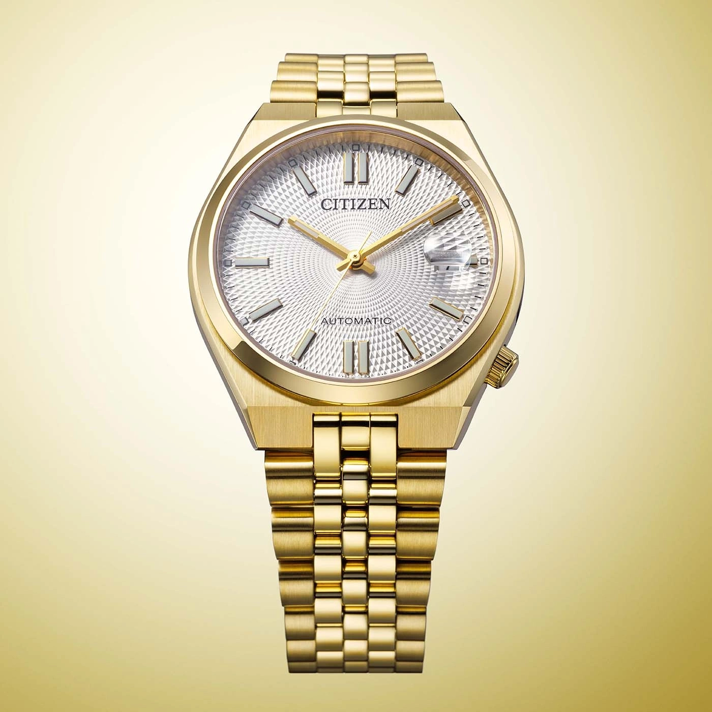 Eine goldene Citizen Automatik-Uhr mit gemustertem weißem Zifferblatt.